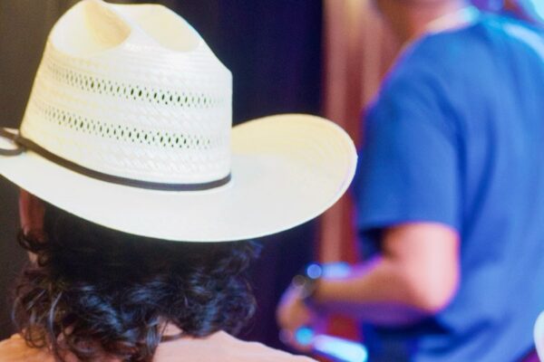 Student watches Music Moves President Reginald James teach at Soul Band Camp.